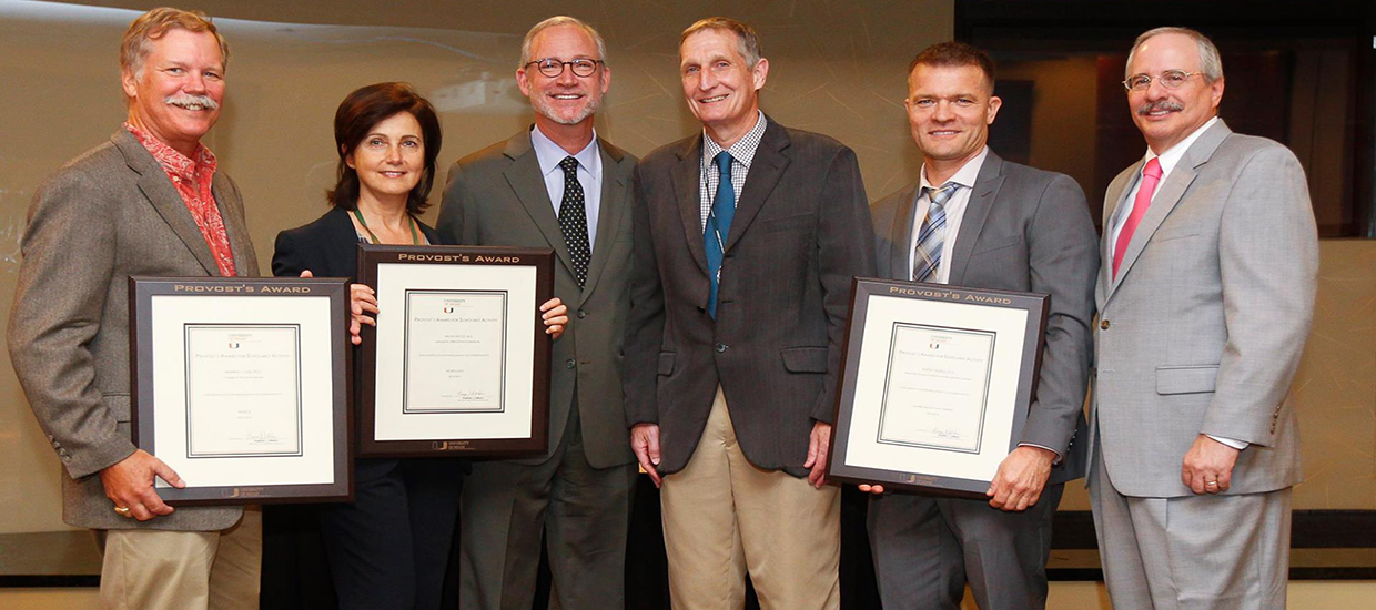 Martin and two fellow Provost Award recipients and presenters in 2015